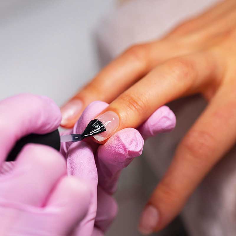 nail-art-professional-working-client-nails